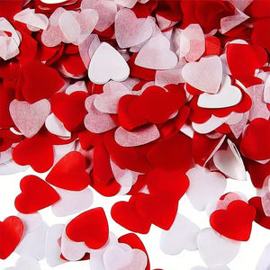 White and red heart shaped paper confetti for Valentine's Day decoration,