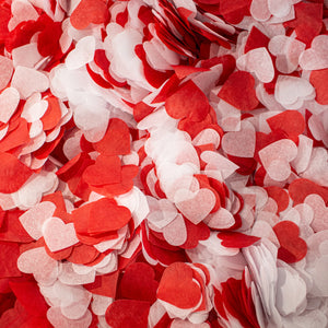 White and red heart shaped paper confetti for Valentine's Day decoration,