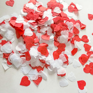 White and red heart shaped paper confetti for Valentine's Day decoration,